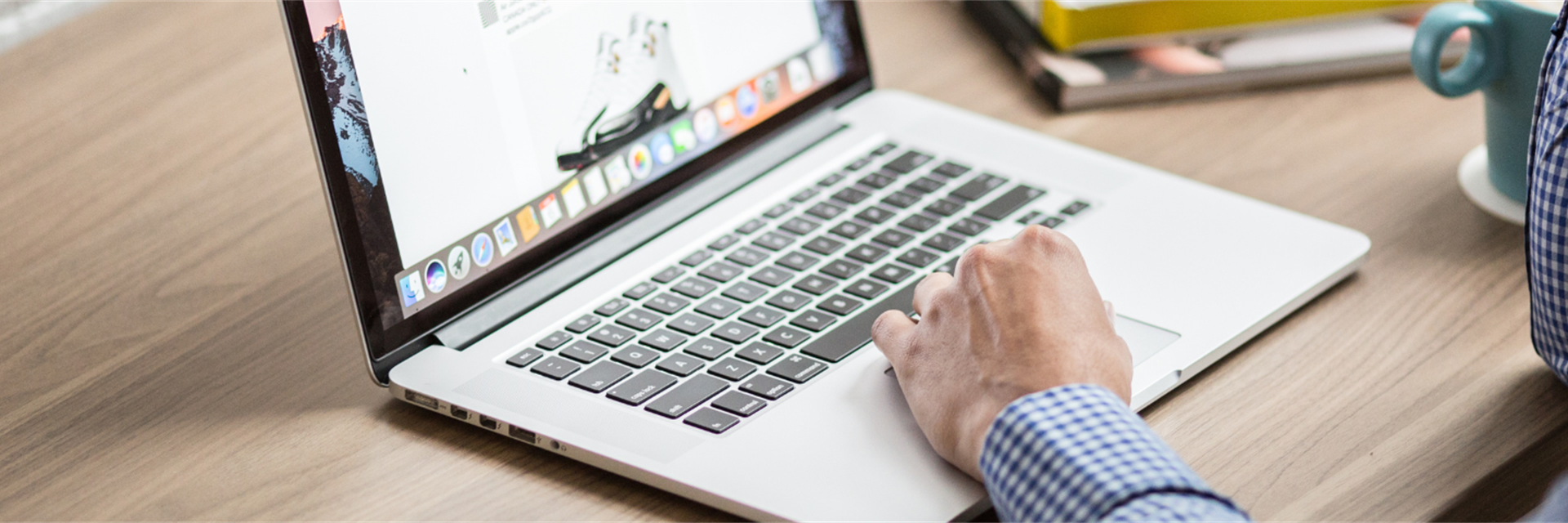 Person doing research on a laptop.